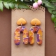 Boucles d'oreilles arcades coloris or, cuivre et violet
