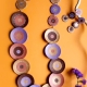 Collier cercles dégradés coloris parme, marron, saumon et or